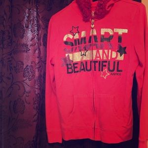 Justice Girl’s hot pink hooded sweater.